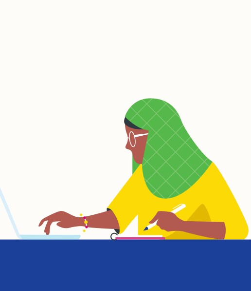 Woman wearing green hijab and glasses on computer
