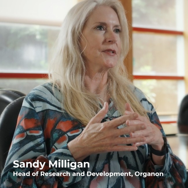 Photograph of Sandy Milligan, Organon Head of Research and Development, discussing impact of unintended pregnancies.
