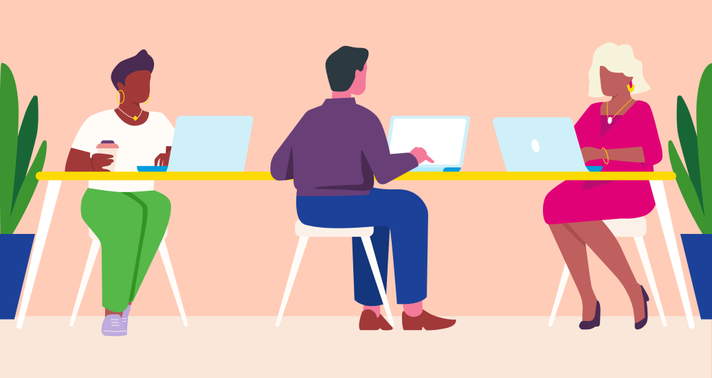group of 3 individuals working at office table with laptop computers