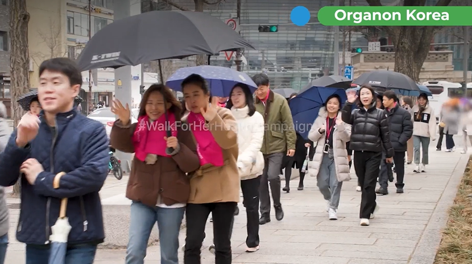 image of organon employees in Korea walking on sidewalk
